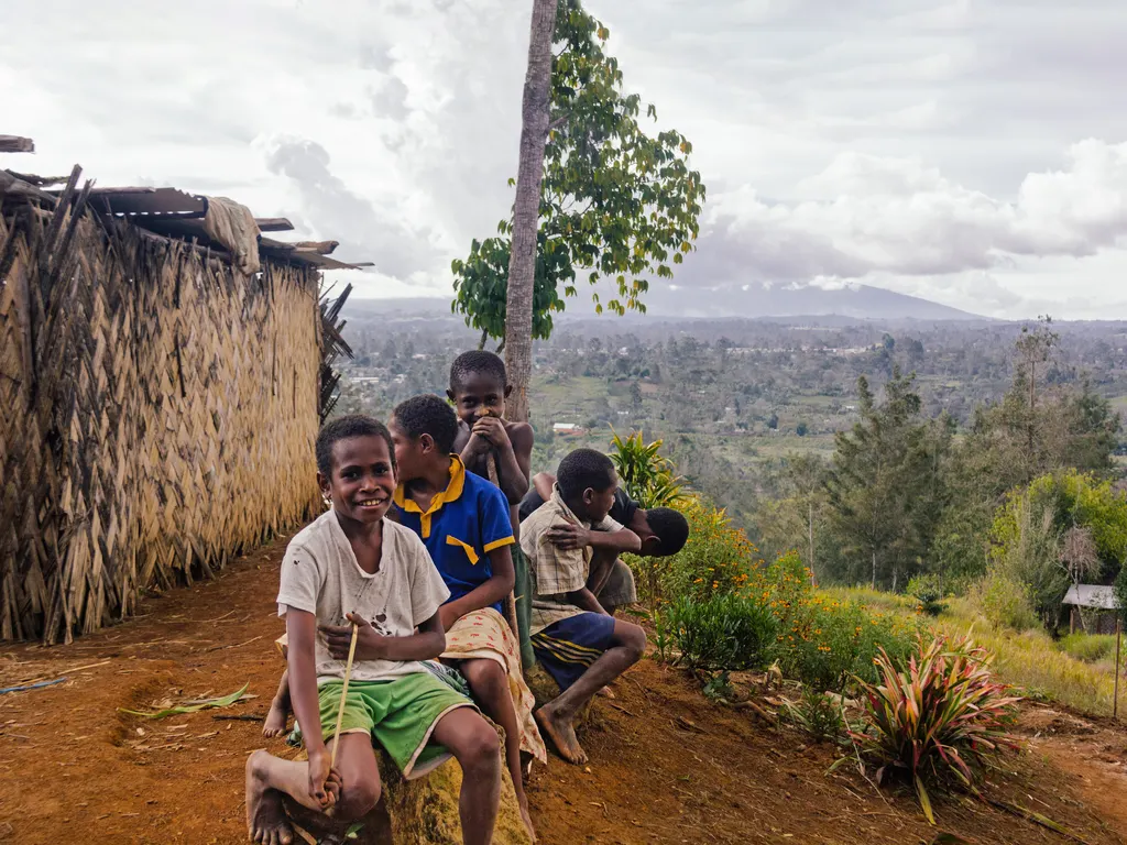 Children outside their home in the Papua New Guinea Highlands